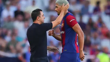 Xavi con Araujo